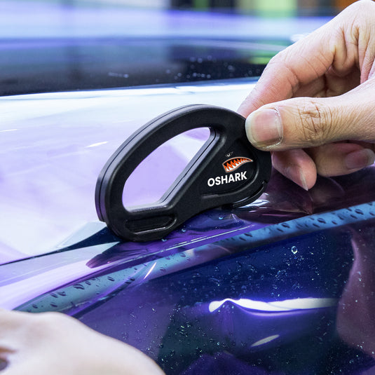 Using safety cutter on car wrap film